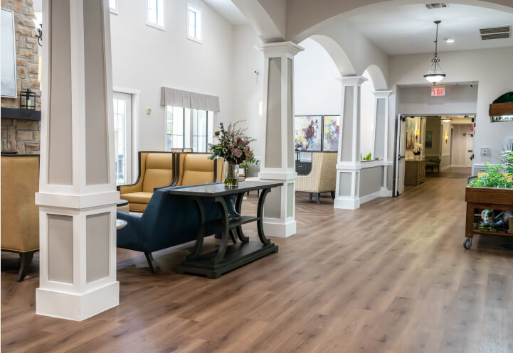 Spacious Lobby with Arched Hallways for Seniors at Assisted Living Facility Spacious Lobby with Arched Hallways for Seniors at Assisted Living Facility