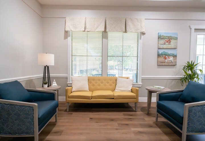 Cozy Lounge with Natural Light for Seniors at Assisted Living Facility