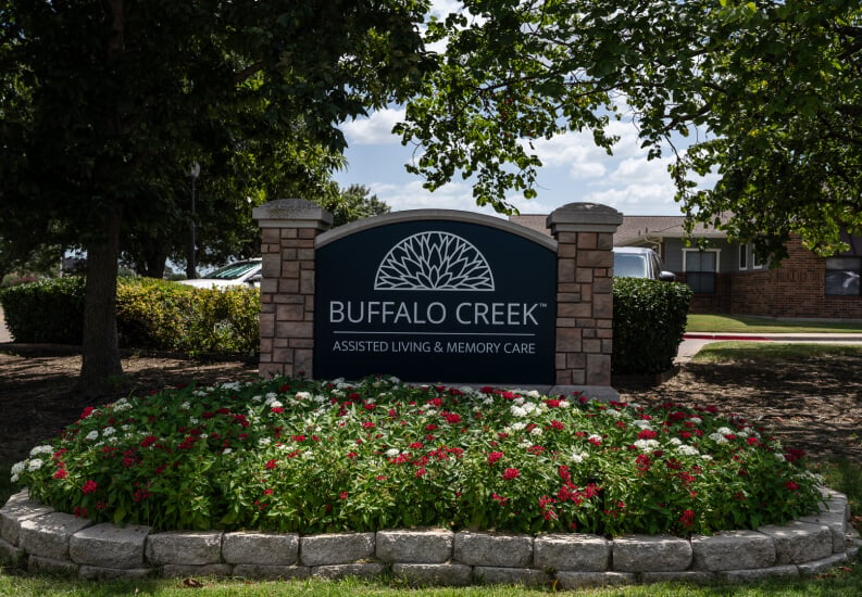 Community Entrance Sign with Flower Garden for Seniors at Assisted Living Facility Community Entrance Sign with Flower Garden for Seniors at Assisted Living Facility