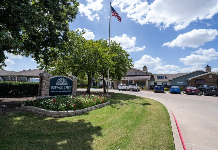 Community Entrance with Landscaped Grounds for Seniors at Assisted Living Facility Community Entrance with Landscaped Grounds for Seniors at Assisted Living Facility